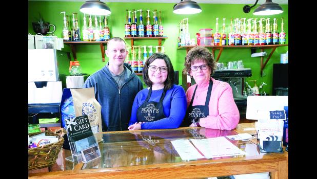 Travis and Brittany DeBarge (shown at left) have purchased Penny's on the west side of the Holton Square. Sally DeBarge (shown at right) is managing the shop.