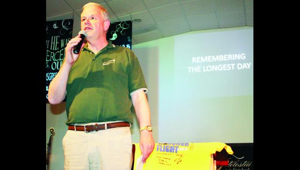 by Brian Sanders Former Jackson Heights superintendent Paul Becker talked about a trip he took to Omaha Beach at Normandy, France last year, marking the 70th anniversary of the D-Day landings. Becker discussed his trip during a fund-raising soup supper this past weekend for the Honor Flight program, which allows local veterans to travel to Washington D.C. for a day for free to visit national monuments and other historic sites.