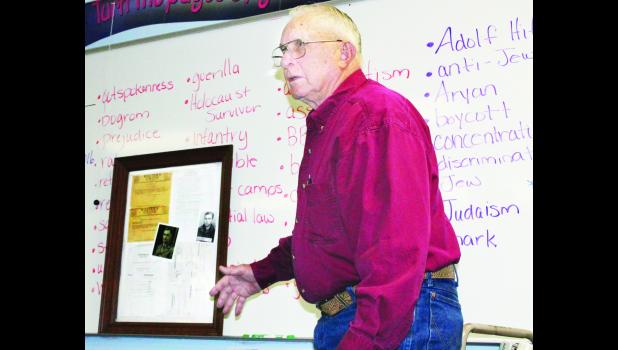 by Brian Sanders Julian Siebert of rural Westmoreland visited Holton Middle School on Monday afternoon to talk about his experiences as a "buck private" in World War II and as a prisoner of war in a German camp. Students at HMS have been studying WWII history and were appreciative of the chance to hear from someone who experienced it firsthand.