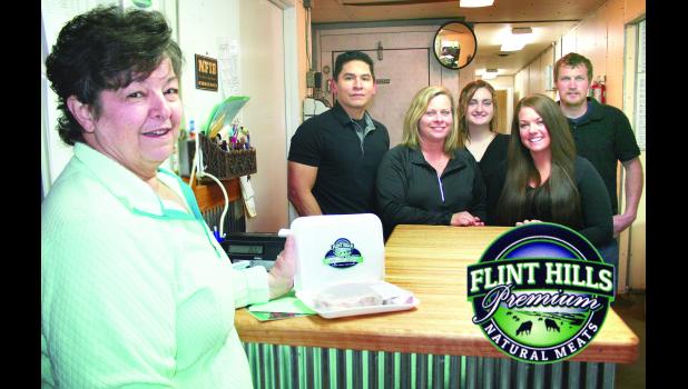 Lynn Rinkes (left), one of the new owners of Holton Meat Processing, is proud to offer Flint Hills Premium Natural Meats products at the facility, which the Rinkes and Pfrang families took over earlier this year. Rinkes is shown in the photo above with some of the facility’s employees, including (from left to right) Ritchie Warren, Dana Klahr, Samantha Carskaddon, Cassey Schooler and Tyler Area. (Photo by Brian Sanders)