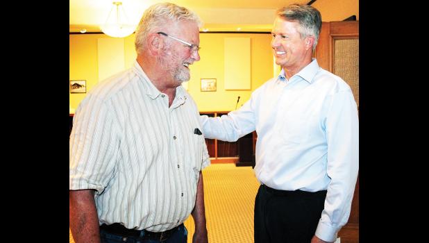 U.S. Sen. Roger Marshall (shown at right) chatted with Holton businessman Dan Harris prior to the start of the senator’s recent “town hall” meeting at the Jackson County Courthouse. (Photo by Brian Sanders)