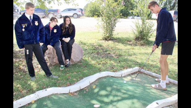 Shown from left to right are Jackson Heights FFA members Jackson Jager, Rylie Strawn, Zoe Turner and Corbin Latham, enjoying the new “putt-putt” golf course that was built using funds donated by the family of Marvin and Melvena Ingels. (Photo by Brian Sanders)