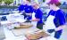 GNBank employees (from left) Jim Klingler, Audrey Kimmi, Theresa Rodecap and Kyrianna Hielscher are shown assembling the meal, which included pulled pork sandwiches, beans, chips and a drink.   