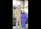 Sean Willcott (shown with daughter Natalie) is in the process of renovating an old building in the 200 block of West Fourth Street in Holton for the eventual opening of a microbrewery. (Photo by Brian Sanders)