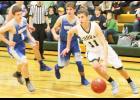 Jackson Heights senior Wyatt Olberding drives to the basket in a recent game against Horton.