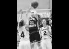 Royal Valley junior Lexi Baker (No. 21) takes a jump shot over a Silver Lake defender during the semi-final sub-state game Friday at Council Grove. Baker was the top-scorer for the Panthers with nine points. 
