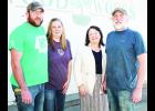 Jeff and Yvonne Terry (shown above at left) have purchased Eubanks Custom Woodworking from Brenda and Mike Eubanks (shown at right), who started the business in 1980.