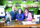 Travis and Brittany DeBarge (shown at left) have purchased Penny's on the west side of the Holton Square. Sally DeBarge (shown at right) is managing the shop.