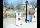 Scott Bartlett (shown above) has recently installed some vintage gasoline pumps, signs and gas pump globes at his former business, Scott’s Shop, along Vermont Avenue in Holton.
