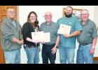 Holton city employees celebrating milestone years of service were recently honored by Mayor Tim Morris (shown above at right). From left to right: Richard Myers, electric production, five years; Amber Fowler-Baxter, administrative assistant and court clerk, 10 years; Mike Reichle, parks and recreation director, 25 years; Nathan Doyle, parks and recreation, 10 years; and Morris. Also honored, but not present at Monday’s meeting, was codes enforcement officer Jeff Draper, celebrating 15 years with the city.