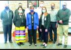 Gov. Laura Kelly (center) recognized the Prairie Band Potawatomi Nation for its efforts to vaccinate members of the Nation and Jackson County residents. Gov. Kelly is shown above with members of the Tribal Council and Kristina Simmons, health center administrator (front row, at right). Tribal council members include Camilla Chouteau (front row, at left) and (back row, from left) Chairman Joseph Rupnick, Zach Pahmahmie, William Evans, Raphael Wahwassuck, Tony Wahweotten and Wade Pahmahmie.