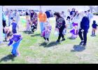 Mayetta Christian Church members hosted an Easter egg hunt at the city park recently. In the photo above, some of the children are shown gathering eggs at the start of the hunt.