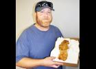 Luke Dieckmann of Holton spotted this giant morel mushroom just outside of Holton on Wednesday. The morel is more than eight inches long and three inches wide. (Photo by Ali Holcomb)