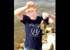 Seth Peterson of Holton snagged this seven-inch bluegill at the event. 