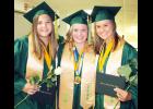 Jackson Heights High School Class of 2020 salutatorian Erin Curtis (left) joined co-valedictorians Jerilyn Nelson (center) and MaKenzie Kennedy to celebrate their graduation. (Photo by Brian Sanders)