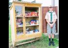 Caliber Miller has built five “blessing boxes” — including this large one located next to Mayetta City Hall — for his Eagle Scout project. (Photo by Ali Holcomb)