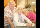 Medicalodges Jackson County resident Vivian Venneberg (center, with Medicalodges employees Lois Kern at left and Amy Spiker at right) celebrated her 100th birthday on Thursday. (Photo by Brian Sanders)