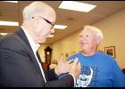 U.S. Senator and 1954 Holton High School graduate Pat Roberts (left) talked with his fellow HHS graduate and former Kansas State University roommate L.D. Fletcher prior to Roberts’ town hall meeting on Thursday at Holton City Hall. (Photo by Brian Sanders)