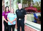 Jon Reed (shown above at right), chief operating officer of Fredonia-based Hometown Health Care, has opened the company’s seventh office on the south- west corner of Holton’s Town Square. Reed is shown with Hometown Health Care marketing specialists Maria Petersen (left) and Kristi Noonan.