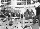 Jackson Heights freshman Kylie Dohl (center) spiked the volleyball past a pair of Oskaloosa defenders while junior Erika White (left) and senior Hannah Williams (second from left) prepared for the return volley during the Cobras' Tuesday night match against the Bears.