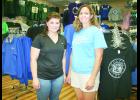 Long-time Lasting Impressions employees Stephanie Riley (left) and Michelle Callison (right) are now the new owners of the Holton custom embroidery, screen printing and vinyl graphics business, having taken over from previous owner Carole Danner in recent days.