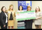 The United Way of Greater Topeka on Thursday presented the Jackson County Ministerial Alliance Christmas Bureau with a $5,000 check for this year’s Christmas Bureau event. Shown from left are Miriam Krehbiel, president and CEO of United Way of Greater Topeka; Carrie Saia and Tonya Barta, co-chairs of the United Way Jackson County Advisory Committee; and Jennifer Ingels and Jennifer Godfrey, Jackson County Ministerial Alliance Christmas Bureau co-directors.
(Photo by Ali Holcomb)