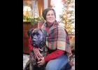 The home of Trisha McAlexander (shown with Kamo the dog), located west of Holton, will be featured on this year’s Christmas Homes Tour. (Photo by Ali Holcomb)