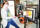 April Lemon has opened a glassblowing studio and art gallery on the east side of the Holton Square. The shop, More Than Lemons, offers a hands-on experience with glassblowing, which Lemon is demonstrating.