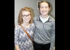 Kaitlynn (left) and Faith Little run for a "greater purpose." (Photo by Brian Sanders)