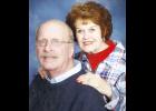 David Gilbert 1949-2021 (at left, with surviving wife Sandy)