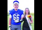 In the photo above, Holton High School seniors Noah Bartel (at left) and Emily Horr (at right) were named homecoming king and queen prior to the Wildcats' home varsity football game against Perry-Lecompton.