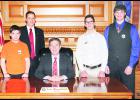 Brothers Jonathan (left), Joseph (second from right) and James Harris (right) of Mayetta spent Jan. 28 at the Kansas Capitol as pages for Sen. Dennis Pyle (second from left). The brothers received a historical tour of the capitol building and had the opportunity to participate in a tour to the top of the dome and climb the 296 steps. The brothers also met Gov Sam Brownback (center). 