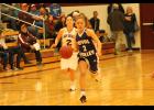 Royal Valley's McKenzie Ogden (purple jersey) dribbles down the court on a fast break play during the Silver Lake basketball game on Dec. 13.