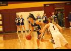 Royal Valley's Bella Thompson (13 purple jersey) tries to beat her defender and score against Silver Lake on Dec. 13.