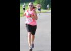 Jamie Johnson-Shaffer competes in the 10K Cauldron Run at the Sunflower State Games recently, with her top finish in her age group a year ago qualifying her to compete in the State Games of America this summer.