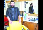 Rob Snavely is cutting hair full time from his new shop on the south side of the Holton Square, Rob's Chop Shop. The business previously served as the location of Bob Morgan's Barbershop for more than 50 years. 
