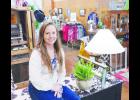 Inspired by her mother’s home goods store in Illinois, Kayley Dvorak (shown above) has opened The Rustic Spur on the north side of the Holton Square at 108 W. Fifth St. The business features antiques, furniture, collectibles and items from a variety of local vendors.