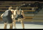 Royal Valley sophomore wrestler Bryce Garrison begins his match with his opponent from ACCHS on Jan. 26.